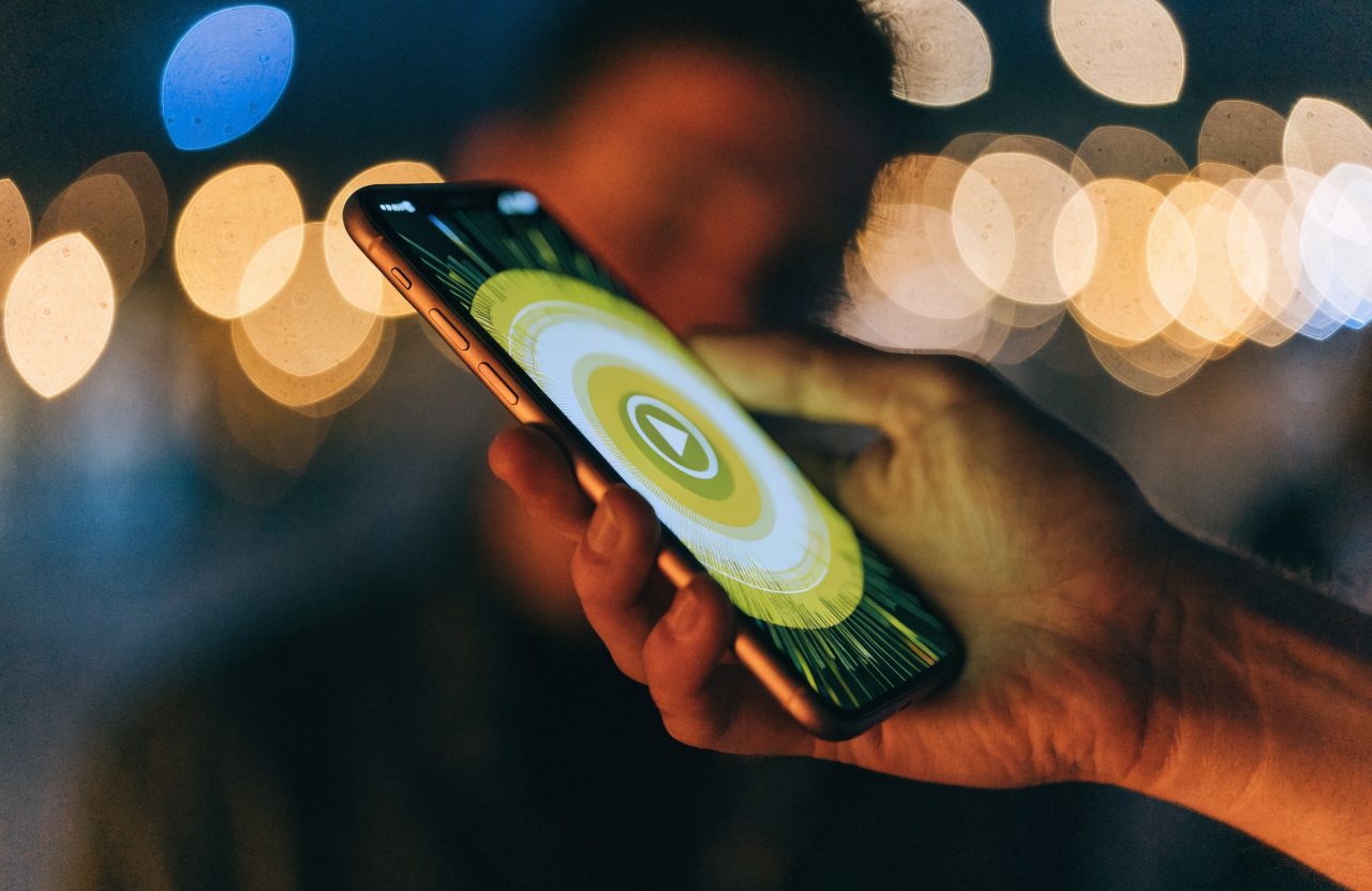 A music video playing on a phone